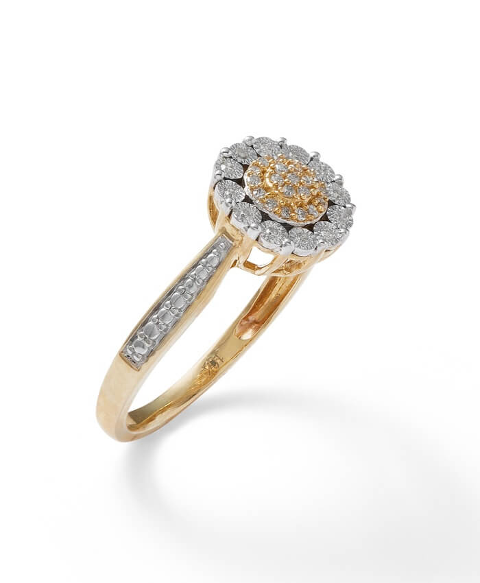 1/10 CT. T.W. Diamond Flower Frame Ring in 10K Gold